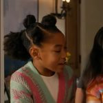 Mara’s pink and green stripe cardigan on 9-1-1