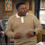 Marty’s beige contrast collar polo sweater on The Neighborhood