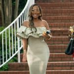 Angela’s metallic ruffle off shoulder dress on The Real Housewives of Atlanta
