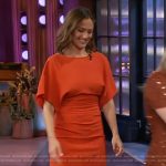 Minka Kelly’s orange drape dress on The Kelly Clarkson Show