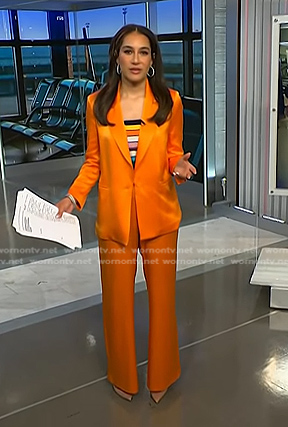Morgan’s orange satin blazer and pant suit on NBC News Daily