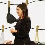 Kimmay Caldwell’s black metallic foil wrap dress on The Drew Barrymore Show