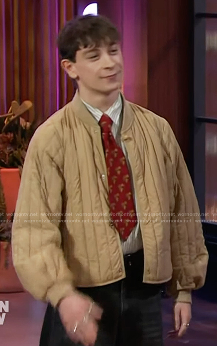 Louis McCartney’s beige padded bomber jacket on The Kelly Clarkson Show