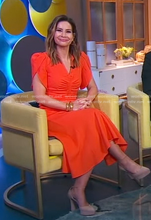 Rebecca Jarvis’s orange ruched front dress on Good Morning America