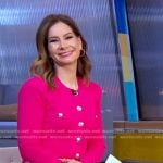 Rebecca’s pink cardigan and print pleated skirt on Good Morning America