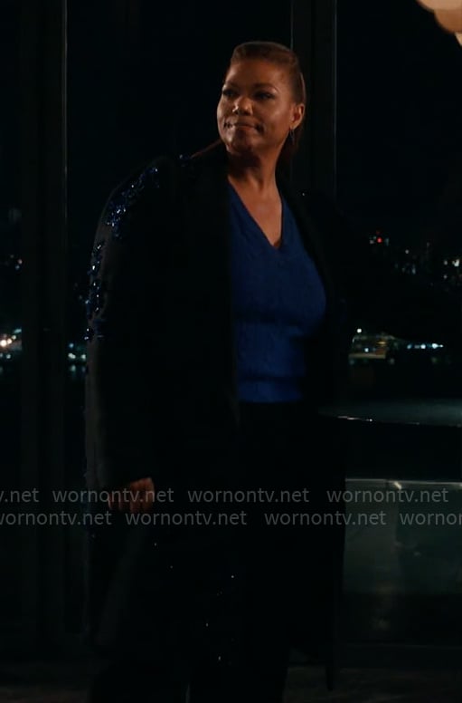 Robyn’s black coat with blue stone embellishments on The Equalizer