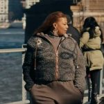 Robyn’s fleece jacket with eye brooch on The Equalizer