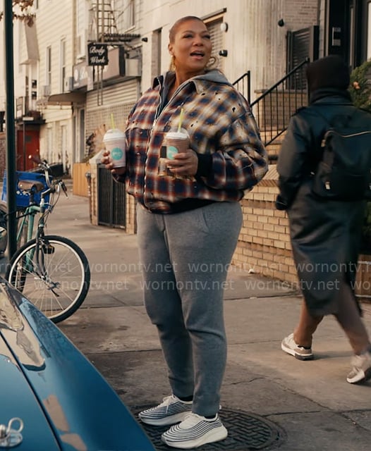 Robyn’s mixed plaid jacket and spiral hoop earrings on The Equalizer