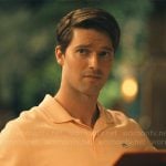 Saxon’s orange polo shirt on The White Lotus