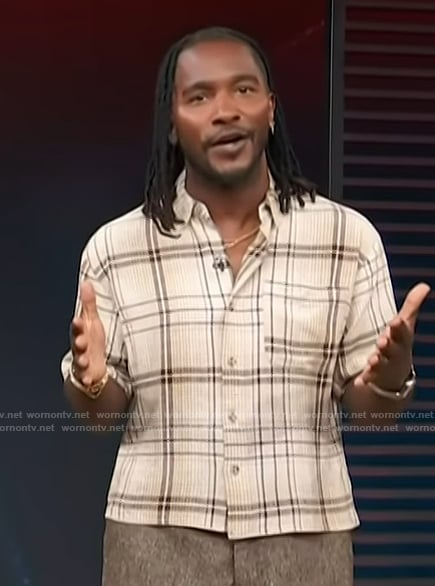 Scott’s plaid shirt on Access Hollywood