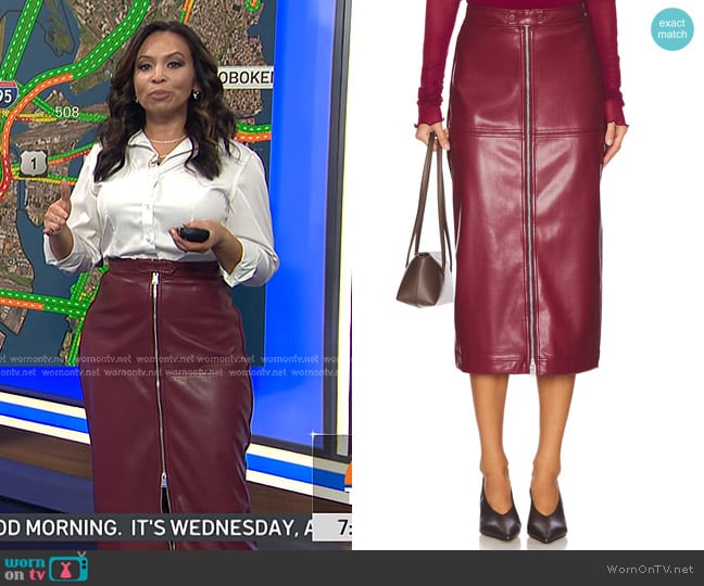Simkhai Bianca Faux Leather Midi Skirt in Oxblood worn by Adelle Caballero on Today