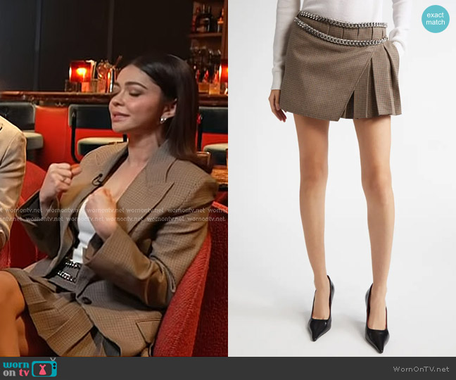 Stella McCartney Chain Detail Pleated Houndstooth Wool Wrap Miniskirt worn by Sarah Hyland on Today