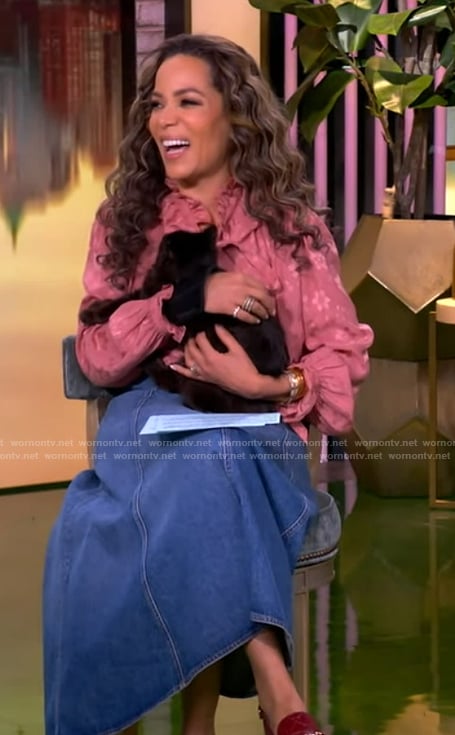 Sunny’s pink floral print tie neck blouse on The View
