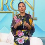 Tamron’s floral print sheer blouse and skirt on Tamron Hall Show
