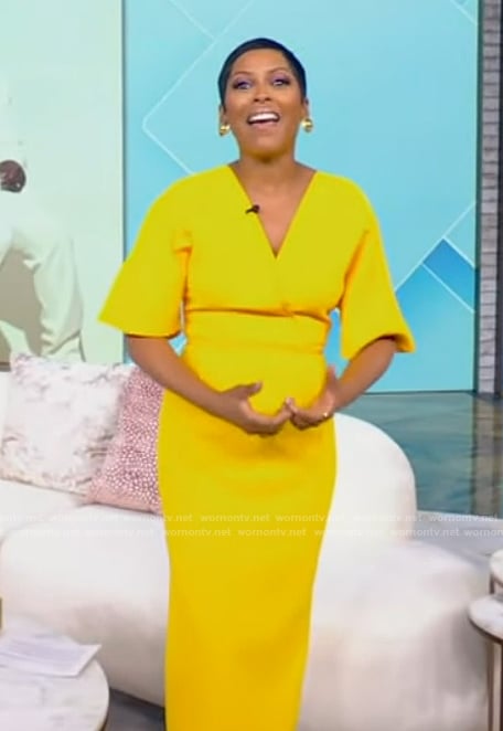 Tamron’s yellow surplice dress on Tamron Hall Show
