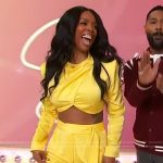 Tasha Smith’s yellow cropped top and belted pants on Sherri