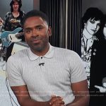 Justin’s gray cable knit polo on E! News