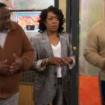 Tina’s silver floral jacquard suit on The Neighborhood