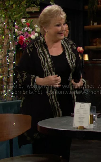Traci’s black butterfly print jacket on The Young and the Restless
