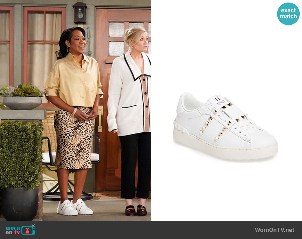 Valentino Garavani Rockstud Sneaker worn by Tina Butler (Tichina Arnold) on The Neighborhood