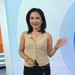 Vicky’s beige knit vest and black button skirt on Today