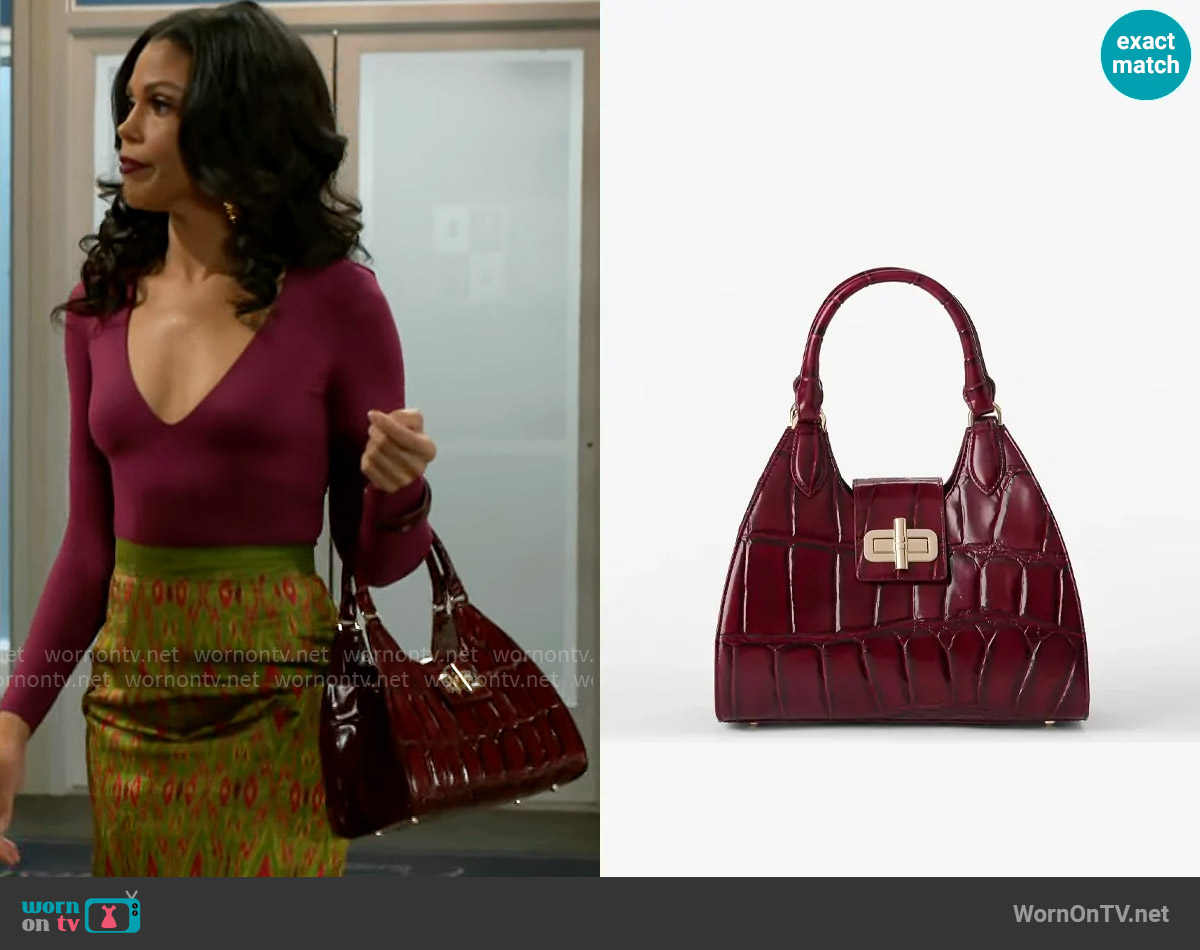 Brahmin Adrian Bag in Merlot Nerina worn by Dani Dupree (Karla Mosley) on Beyond the Gates