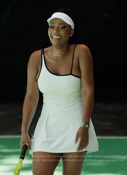 Angela’s white asymmetric strap mini dress on The Real Housewives of Atlanta