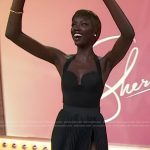 Anok Yai’s black pleated skirt and top on Sherri