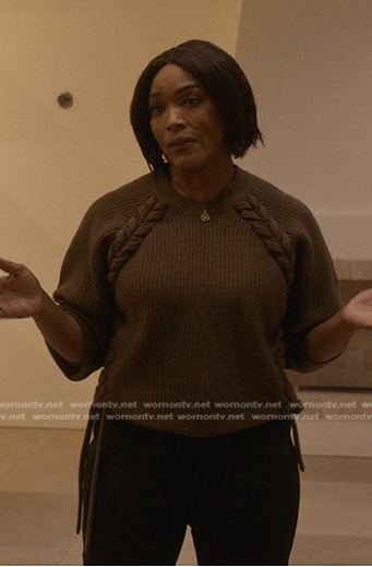 Athena’s khaki lace-up knit sweater on 9-1-1
