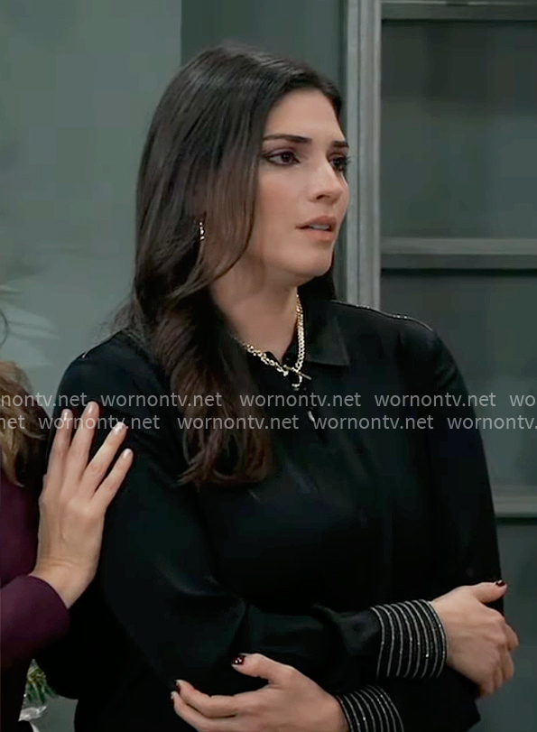 Brook Lynn’s black blouse with metallic stripe cuffs on General Hospital