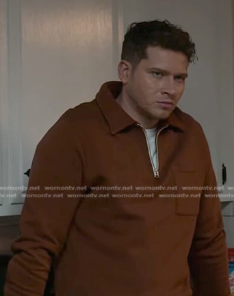 Buck’s brown half zip sweatshirt on 9-1-1