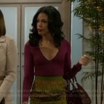 Dani’s magenta v-neck top and green printed skirt on Beyond the Gates