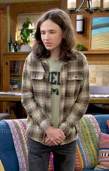 Grover’s brown plaid shirt on The Neighborhood