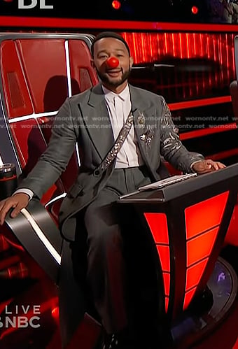 John Legend’s grey embellished long blazer and pleated pants on The Voice
