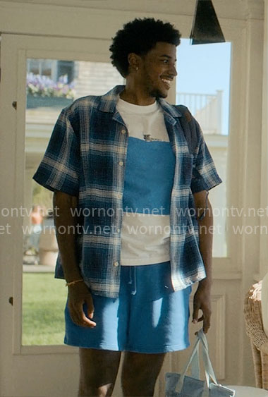 Justin’s blue square graphic t-shirt and plaid shirt on Forever