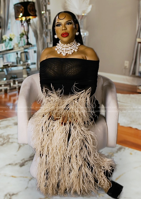 Kelli’s feather trim confessional dress on The Real Housewives of Atlanta