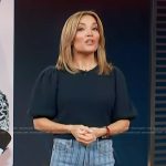 Kit’s navy puff sleeve top and striped jeans on Access Hollywood