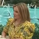 Kit’s yellow floral print mini dress on Access Hollywood