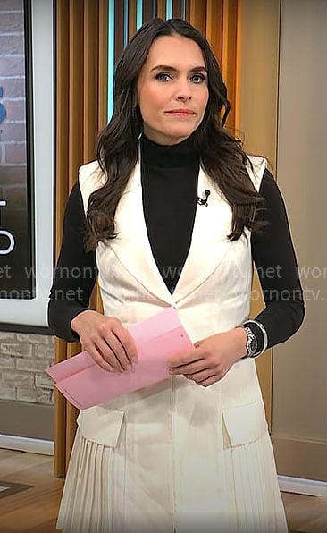 Lilia Luciano’s white pleated sleeveless blazer dress on CBS Mornings