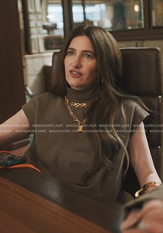 Maya’s brown mock neck top on The Studio