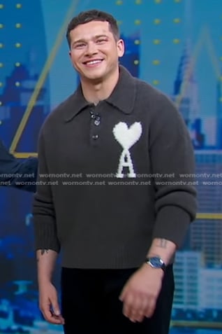 Oliver Stark’s grey logo print polo sweater on Good Morning America