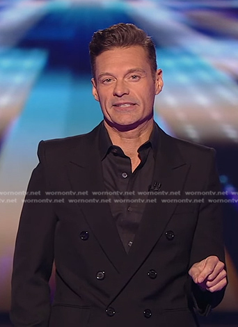 Ryan Seacrest’s black double breasted blazer on American Idol