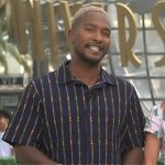Scott’s multicolored stripe shirt on Access Hollywood