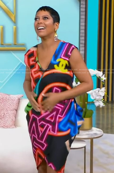 Tamron’s neon lights print dress on Tamron Hall Show