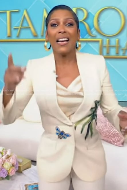 Tamron’s white banana leaf embellished blazer on Tamron Hall Show