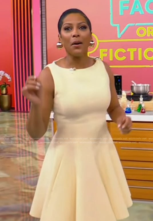 Tamron’s yellow sleeveless mini dress on Tamron Hall Show