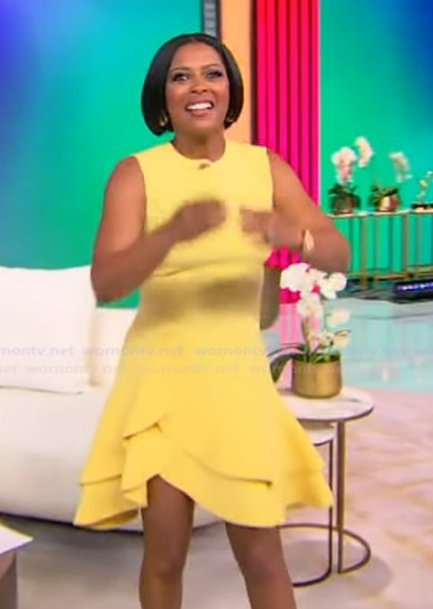 Tamron’s yellow ruffle mini dress on Tamron Hall Show