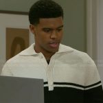 Tyrell’s cream and black striped polo sweater on Beyond the Gates