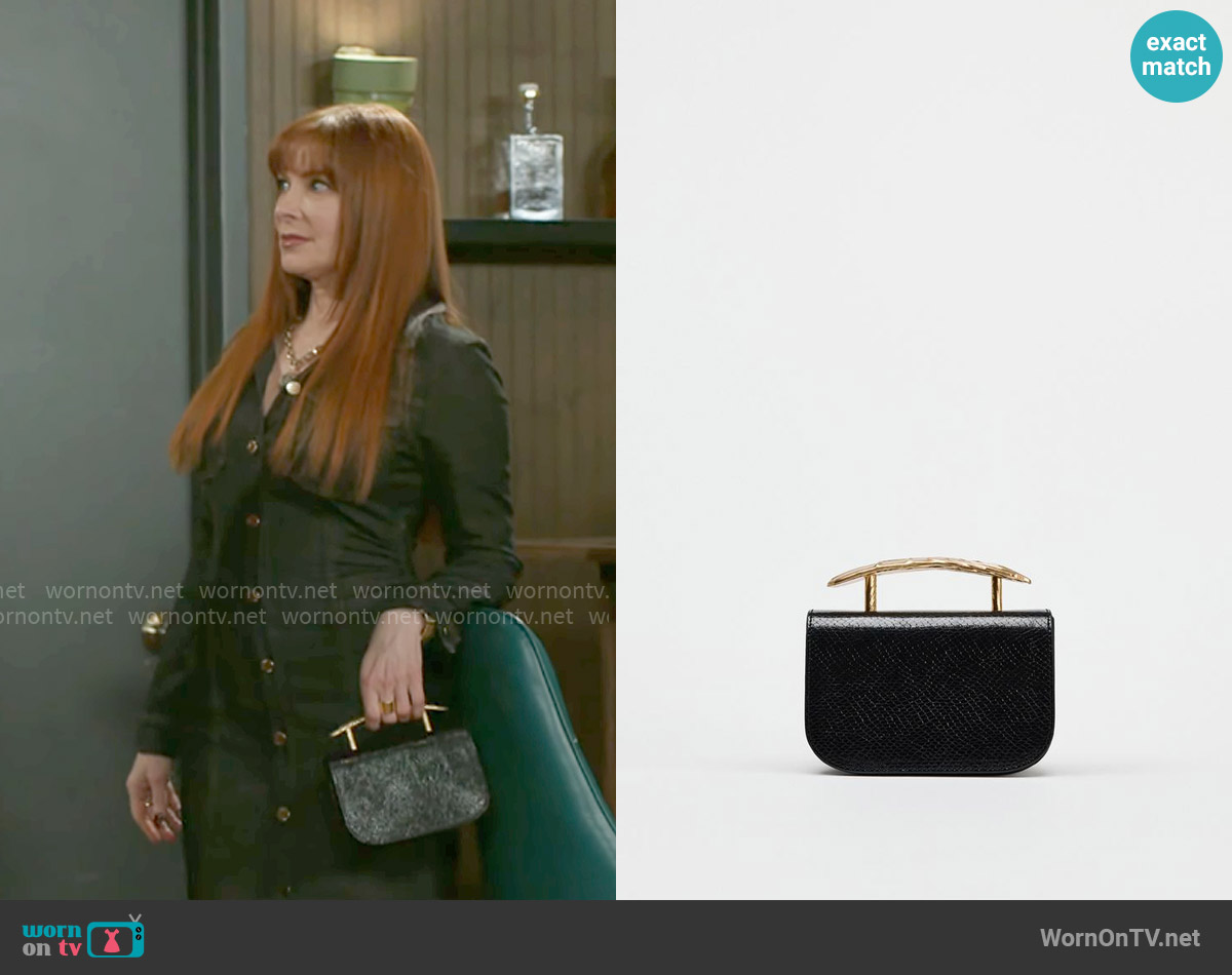 Zara Metallic Handle Handbag worn by Pamela Curtis (Cady McClain) on Beyond the Gates