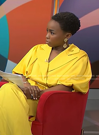 Zinhle’s yellow puff sleeve wrap blouse on NBC News Daily